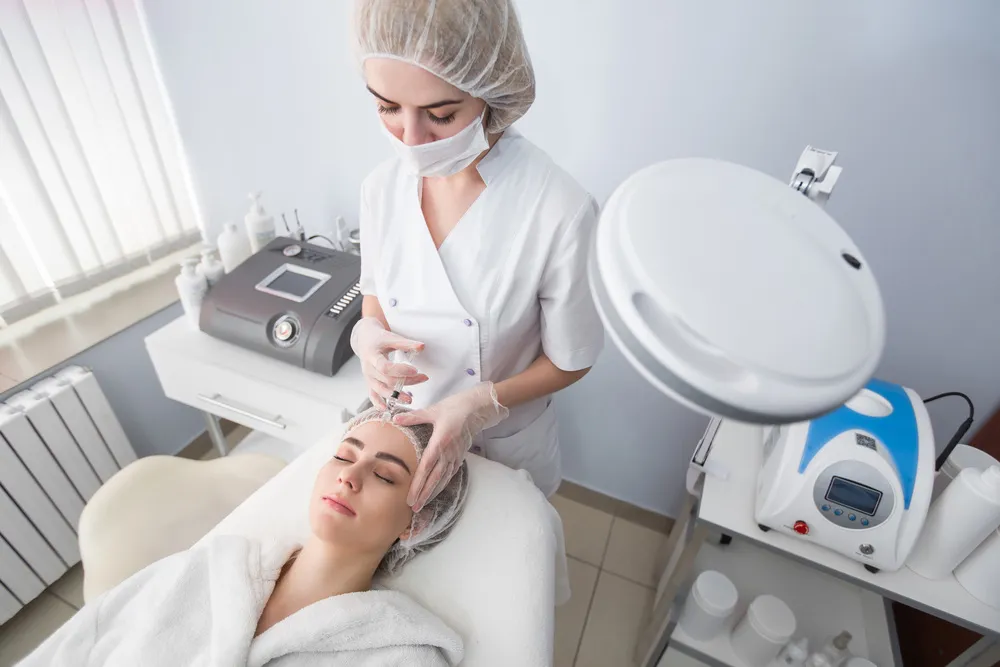 young woman getting a top prejuvenation treatment near Ann Arbor
