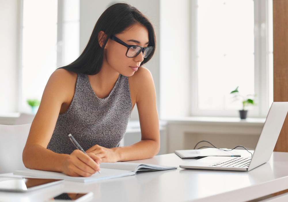 woman researching the best microneedling pricing in Canton MI