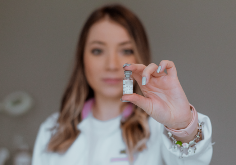 injector holding vial of dermal fillers in Canton