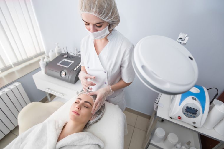 young woman getting a top prejuvenation treatment near Ann Arbor