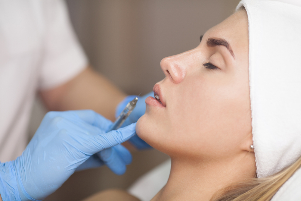 woman getting lip fillers near Ann Arbor MI